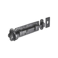 Spira Brass Straight Surface Bolt in a dark finish, featuring a rectangular design with a sliding mechanism and matching strike plate for secure closure.