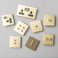 Satin Brass Switches and Sockets - Straight Knurled Design