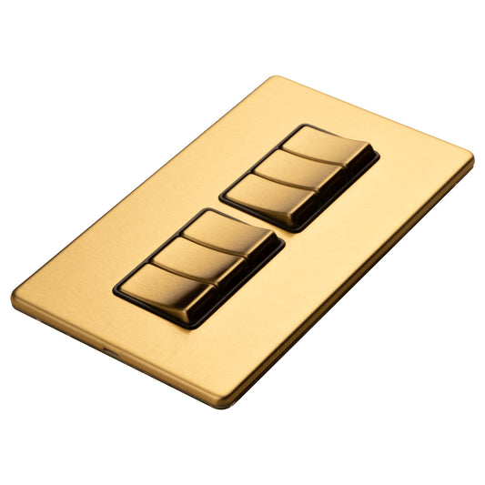 Eurolite Concealed 3mm 6 Gang 2Way Switch in satin brass, featuring a sleek rectangular design with three toggle switches. The surface has a smooth finish, providing a modern look for electrical control.