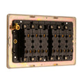 Eurolite Concealed 3mm 6 Gang 2Way Switch in satin brass finish, featuring six black switch mechanisms with clear screw terminals and a transparent plastic cover.