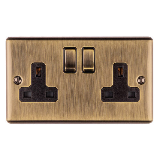 Eurolite Enhance Decorative 2 Gang Socket in antique finish, featuring two black socket outlets and dual switches, designed with a brushed brass look.