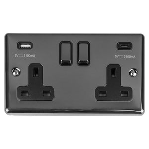 Eurolite Enhance Decorative 2 Gang 13Amp Switched Socket in black nickel, featuring two electrical outlets and dual USB-C ports for charging. The surface has a sleek finish with visible specifications for output power.