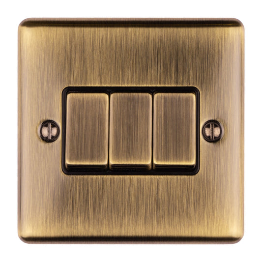 Eurolite Enhance Decorative 3 Gang Switch in antique finish, featuring three toggle switches set within a square metal plate with a brushed texture and visible mounting screws.
