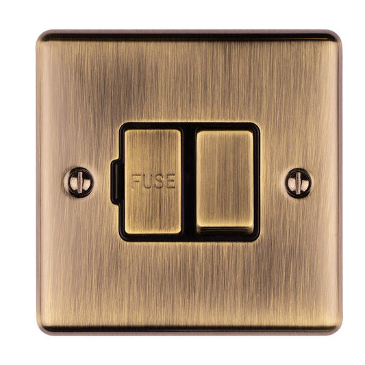 Eurolite Enhance Decorative Switched Fuse Spur in antique finish, featuring a brushed metal surface with a two-switch design and engraved 'FUSE' label, installed with visible mounting screws.