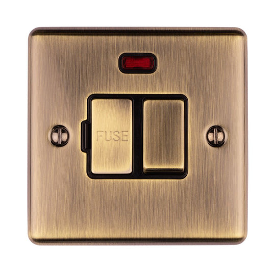 Eurolite Enhance Decorative Switched Fuse Spur with Neon Indicator in antique finish, featuring a switch and fuse compartment, complemented by a bright red indicator light and a brushed metal surface.