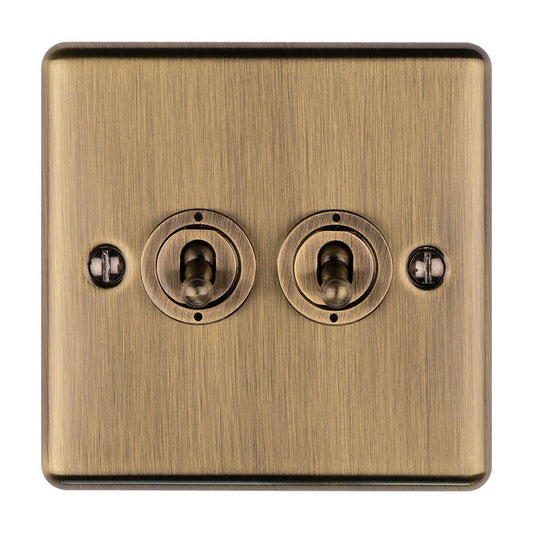 Eurolite Enhance Decorative 2 Gang Toggle Switch in antique finish, featuring two toggle switches and a brushed metal surface design.