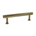 Atlantic Millhouse Brass Pennington Hexagonal T-Bar Cabinet Pull Handle measuring 128mm, featuring a hexagonal design in a warm brass finish with two cylindrical mounts.