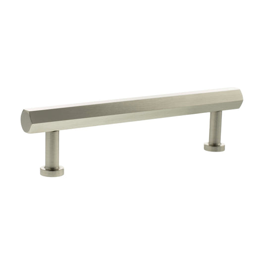 Atlantic Millhouse Brass Pennington Hexagonal T-Bar Cabinet Pull Handle, measuring 128mm, features a brushed brass finish with a sleek hexagonal design and is supported by two cylindrical ends.