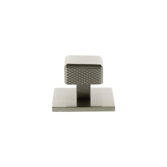 Atlantic Millhouse Brass Eiffel Knurled Square Cabinet Knob Handle on Backplate featuring a square design with a knurled texture, finished in brushed brass, mounted on a rectangular backplate.