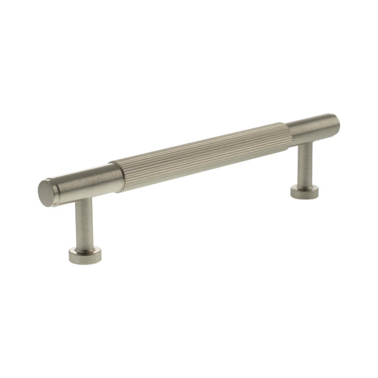 Atlantic Millhouse Brass Battersea Linear T-Bar Cabinet Pull Handle measuring 128mm, featuring a brushed brass finish with ribbed detailing and mounted on two round bases.