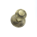 Atlantic Old English Ripon Solid Brass Reeded Mortice Knob on Concealed Fix Rose, featuring a round knob with reeded design and a matching circular rose in an antique brass finish.