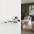 Status Indiana lever on round rose - Satin Chrome / Polished Chrome