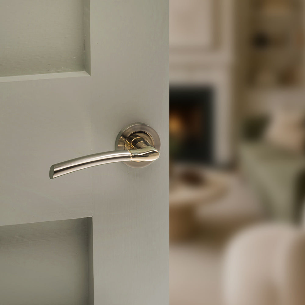 Status Indiana lever on round rose - Satin Nickel / Polished Brass