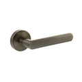 Atlantic Status Carolina Lever Handle on Round Rose — Satin Brass