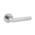 Atlantic Status Carolina Lever Handle on Round Rose — Satin Brass