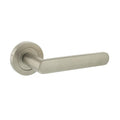 Atlantic Status Carolina Lever Handle on Round Rose — Satin Brass