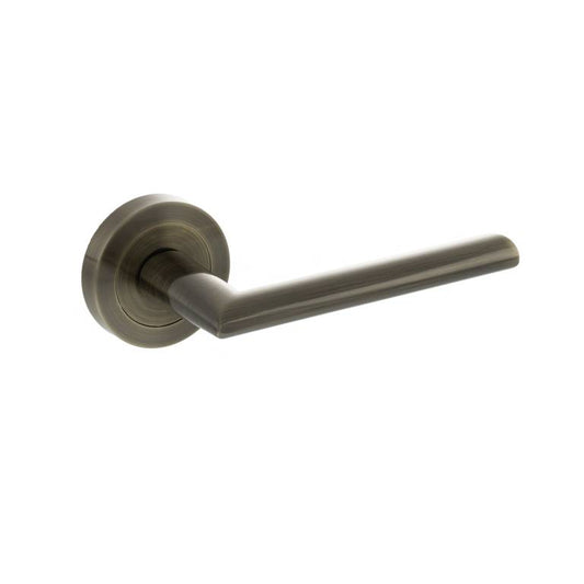 Atlantic STATUS Alabama Lever Door Handle on Round Rose, featuring a brushed bronze finish with a sleek, modern lever design and a rounded rose plate.