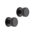 Spira Brass Connaught Knurled Door Knob in a matte black finish, featuring a smooth round design with knurled detailing for added grip, suitable for modern door installations.