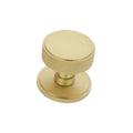 Spira Brass Connaught Knurled Door Knob in a brushed brass finish, featuring a smooth circular top and textured knurled edges for grip.