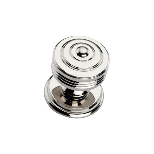 Spira Brass Carter Mortice/Rim Door Knob in polished chrome finish, featuring a circular design with ribbed detailing and a smooth knob top.
