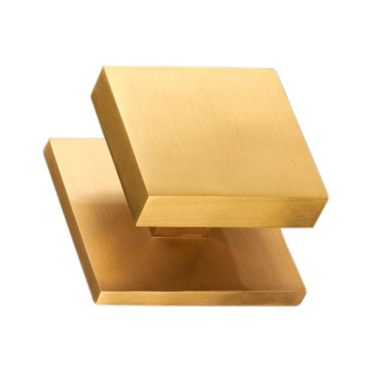 Spira Brass Square Centre Door Knob in a brushed brass finish with a geometric square shape and smooth surface, featuring a simple design for modern decor.