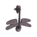 Spira Brass Dragonfly Door Knocker with an intricate dragonfly design featuring textured wings and a curved body, finished in a dark bronze color.