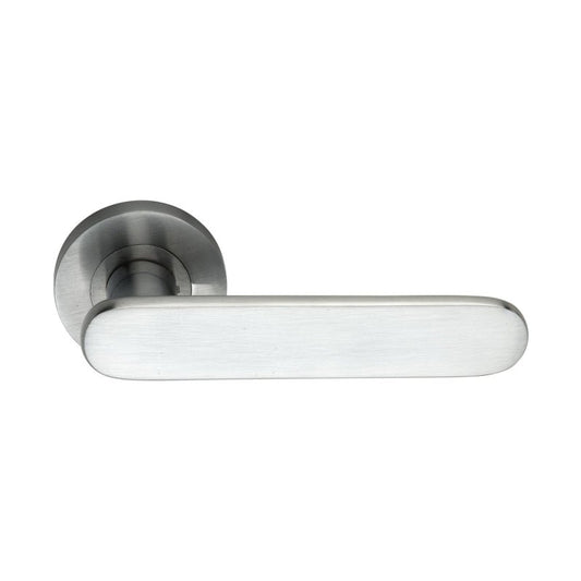 Spira Brass Skyla Lever Door Handle with a brushed nickel finish, featuring a smooth, elongated levers and a round rose plate. The design emphasizes simplicity and functionality.