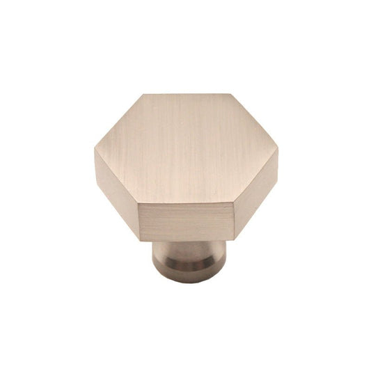 Spira Brass Hexagonal Cupboard Knob in brushed nickel finish, featuring a geometric hexagonal shape and a cylindrical base for easy installation.