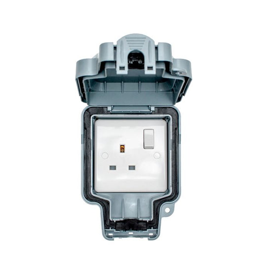 Eurolite Utility 1 Gang Switched Socket in grey, featuring a rectangular design with an accessible switch and two vertical sockets, housed in a protective grey casing that opens from the top.