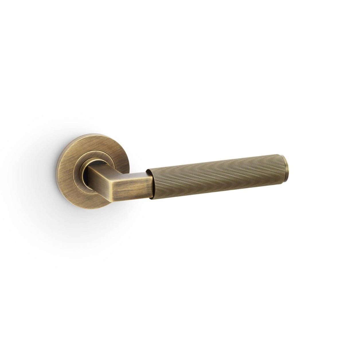 Alexander & Wilks Handles Antique Brass AW - Hurricane Reeded Lever on Round Rose
