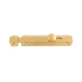 Carlisle Brass Surface Bolt in gold finish, consisting of a rectangular metal body with a round knob for locking mechanism, designed for securing doors or gates.