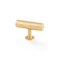 Alexander & Wilks Leila Hammered T-Bar Knob in a golden finish, featuring a textured surface and a cylindrical shape with a round base for mounting.