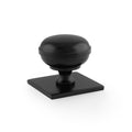 Alexander & Wilks Quantock Cupboard Knob on Square Backplate in black, featuring a rounded knob design mounted on a flat square backplate, crafted from durable metal.