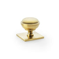 Alexander & Wilks Quantock Cupboard Knob on Square Backplate in brushed brass finish, featuring a rounded knob design mounted on a square backplate for easy grip.