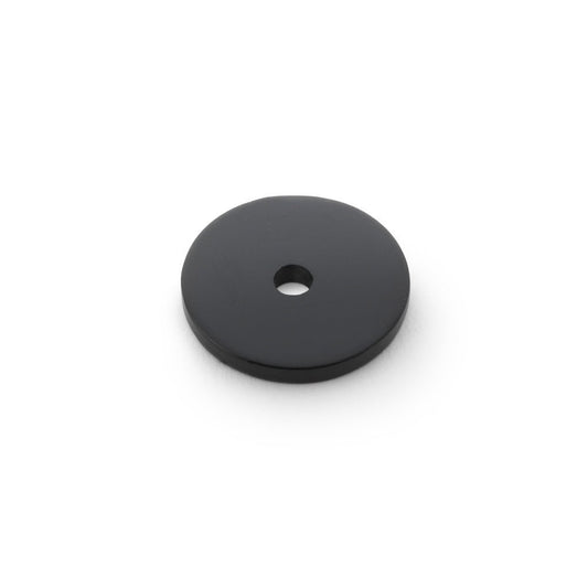 Alexander & Wilks Circular Backplate in black, featuring a circular design with a central hole, made of durable material for wall fixture applications.