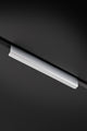 Alexander & Wilks Tilly Finger Pull in sleek white finish, designed for a seamless and minimalist appearance, shown attached to a dark surface.