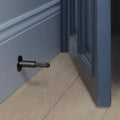 Buster + Punch Door Stop / Wall / Cross Smoked Bronze