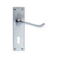 Carlisle Brass Contract Victorian Scroll Lever on Backplate in a polished stainless steel finish, featuring a curved lever handle and rectangular backplate with screw holes and a keyhole opening.
