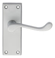 Carlisle Brass Contract Victorian Scroll Lever on Backplate in brushed stainless steel finish, featuring a curved lever attached to a rectangular backplate with four screw holes.