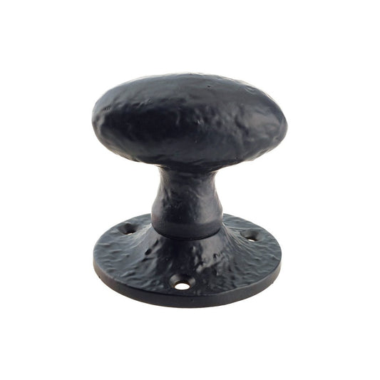 Zoo Hardware Oval Mortice Knob in black, measuring 2.5 inches, features a round, un-sprung design with a textured finish and a circular base for mounting.