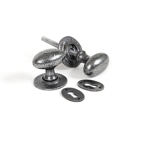 From The Anvil Knobs Oval Pewter Oval Mortice/Rim Knob Set