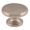 Carlisle Brass Oxford Knob in brushed nickel finish, featuring a round, flat surface with a slightly curved base for cabinetry or furniture applications.