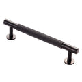 Carlisle Brass Lines Pull Handle Range in a dark finish with a ribbed profile and two round mounting bases, designed for cabinets and drawers.