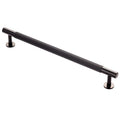 Carlisle Brass Lines Pull Handle Range in dark bronze finish, featuring a ribbed design and mounted on two round bases.