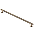 Carlisle Brass Lines Pull Handle Range in antique brass finish, featuring a ribbed design and two mounting posts for easy installation.