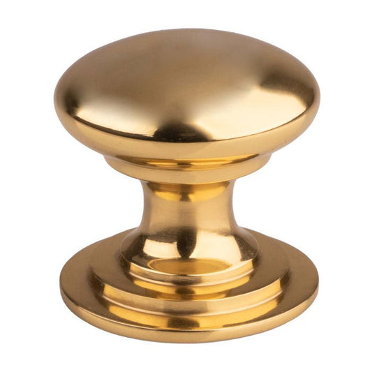Carlisle Brass Victorian Cupboard Knob in polished gold finish, featuring a rounded top and a circular base for a classic design.