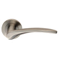 Carlisle Brass SWL Tirolo Lever on Rose in a brushed nickel finish, featuring a slender lever design attached to a round rose plate for secure mounting.