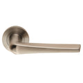 Carlisle Brass SWL Plaza Lever on Rose in a brushed nickel finish, featuring a sleek, contoured lever design and a round rose to complement modern door aesthetics.