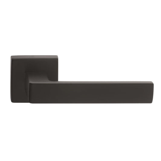 Carlisle Brass Manital Techna Lever on Square Rose with a 51mm rose diameter, featuring a rectangular shape and a matte black finish. This door lever is designed with a sleek, modern style and an angular profile.