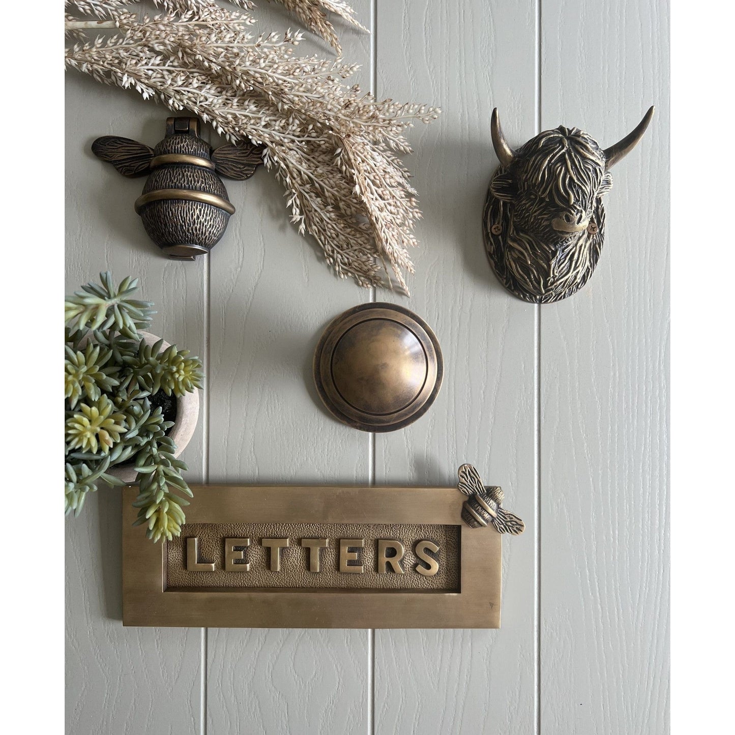 Brass bee door knocker and letter plate